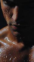 A man with water droplets on his chest photo