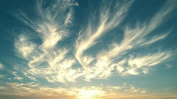 A beautiful sunset with clouds in the sky photo