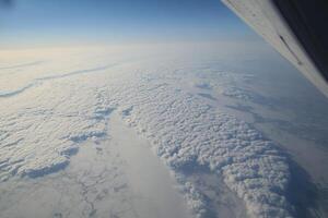 A view of the clouds from an airplane photo