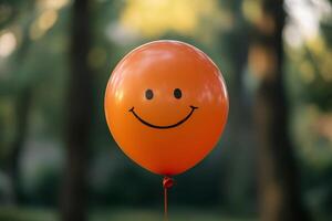 A smiley face balloon is shown in the air photo