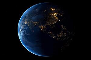 The earth at night with lights on photo