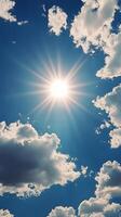 The sun shines brightly in the blue sky photo