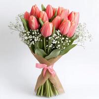 Fresh pink tulip bouquet with delicate filler flowers wrapped in rustic burlap and a ribbon photo
