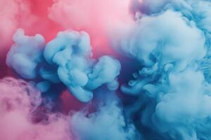Colorful smoke swirling in the air creating vibrant patterns in shades of blue and pink photo