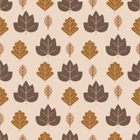 Seamless pattern with autumn leaves on a beige background vector