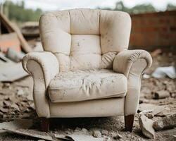 Dusty armchair in abandoned building photo