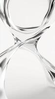 Abstract silver curves intertwine, creating a dynamic, flowing composition. photo