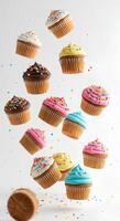 Falling cupcakes on white background High-quality image of cupcakes cascading down on a white background ideal for creative food campaigns baking tutorials or whimsical designs photo