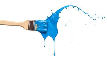 Paintbrush with fresh blue paint splatter top view on white background Clean top-view image of a paintbrush with blue paint splatters on a white background great for art projects or creative content photo