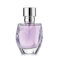 Simple yet luxurious perfume bottle isolated on white background with shadow. The unbranded reflective design highlights elegance and class, perfect for high-end fragrance promotions photo