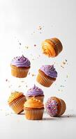 Cupcakes in motion isolated on white background Dynamic image of cupcakes falling gracefully on a white background great for dessert promotions bakery branding or fun social media content photo