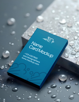 A teal name card mockup rests on a wet surface psd