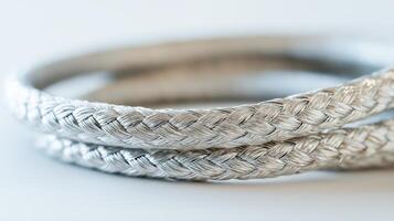 photo of a neatly coiled industrial wires on white background