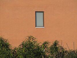 closed window on brick wall photo