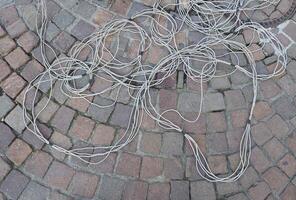 wires on tiled floor photo