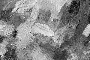 Close-up of abstract black and white textured brushstrokes with rough and layered patterns. Perfect for artistic backgrounds, overlays, and creative projects. photo