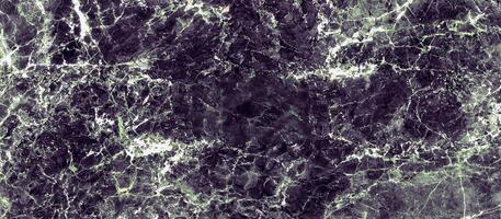 Abstract green and black marble-inspired texture with intricate patterns and organic veining for backgrounds or designs. photo