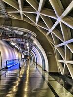 Jeddah, Saudi Arabia on 22 February 2024. Futuristic Underground Tunnel Modern Architecture Blue Lighting Walkway photo