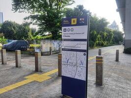 Jakarta, Indonesia on 21 March 2024. Cikoko LRT Station Entrance Sign Detailed Map Information photo