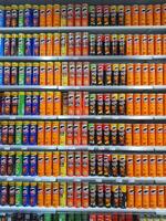 Madinah, Saudi Arabia on 28 February 2024. Pringles Potato Crisps Colorful Cans Grocery Store Shelf Display photo