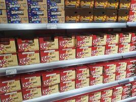 Madinah, Saudi Arabia on 28 February 2024. KitKat White Chocolate Bars Supermarket Shelf Display photo