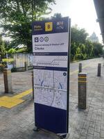 Jakarta, Indonesia on 21 March 2024. Cikoko LRT Station Entrance Sign Map Guide Information photo