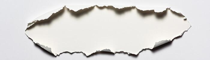Torn paper edge on a white background for creative design. photo