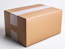A simple brown cardboard box ready for shipping and storage. photo
