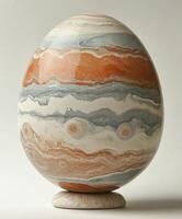 An artistic egg design featuring layered colors and patterns. For Easter egg photo