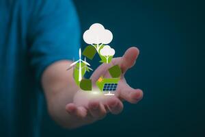 man holding a hand with a recycling symbol and green energy concept photo
