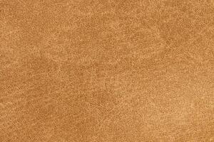 Yellow color textile pattern background. Latte color fabric material, colored background photo