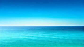 Serene Ocean Meets Azure Sky photo