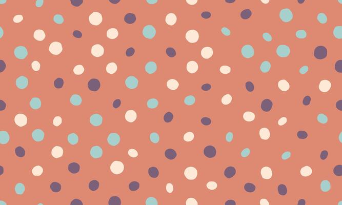 a pattern with polka dots on an orange background