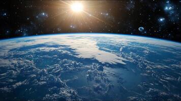 A clear blue sky with a bright sun shining down on the Earth photo