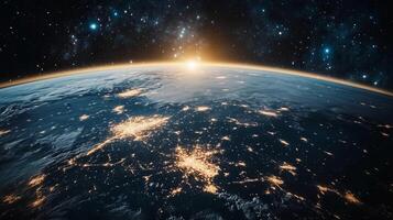 A view of the Earth from space, with the sun rising over the horizon. The sky is filled with stars, creating a serene and peaceful atmosphere. The colors of the sun photo