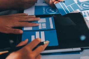A person is using a tablet to make a design photo