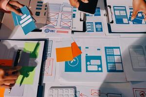 A group of people working on a design project photo