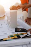 A group of people working on a building project photo