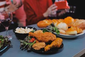 A table with food and wine on it photo