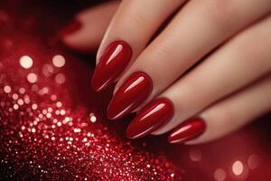 Elegant Red Manicure on Sparkling Background photo