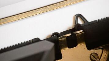 Typing the abbreviation R.I.P. with an old manual typewriter video