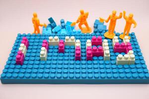 Miniature Workers with 1 May Blocks Labor Day Theme photo