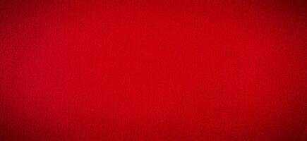 Red suede as a background with a vignette banner size. photo