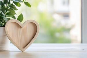wooden Photo frame of heart shape for mockup design on light table background.