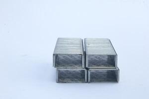 metal staples for stapler isolated on white background photo