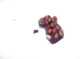 dry cake made from brown sugar and bitten nuts photo