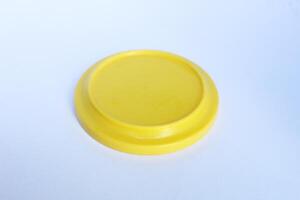 yellow glass lid isolated on white background photo