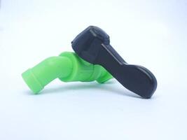 green water tap isolated photo