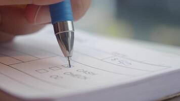 Writing notes in a cozy cafe environment video