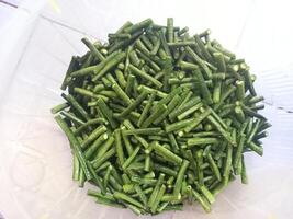 long beans that have been cut into small pieces photo